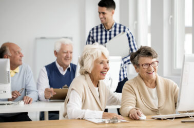 Senior ladies with computer